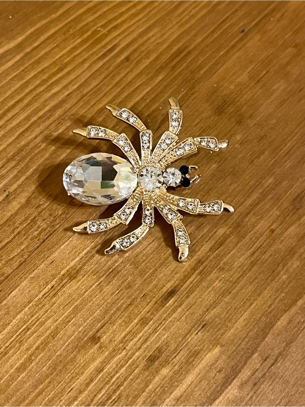 Clear crystal spider with large clear crystal rhinestones on gold tone 1 3/4”